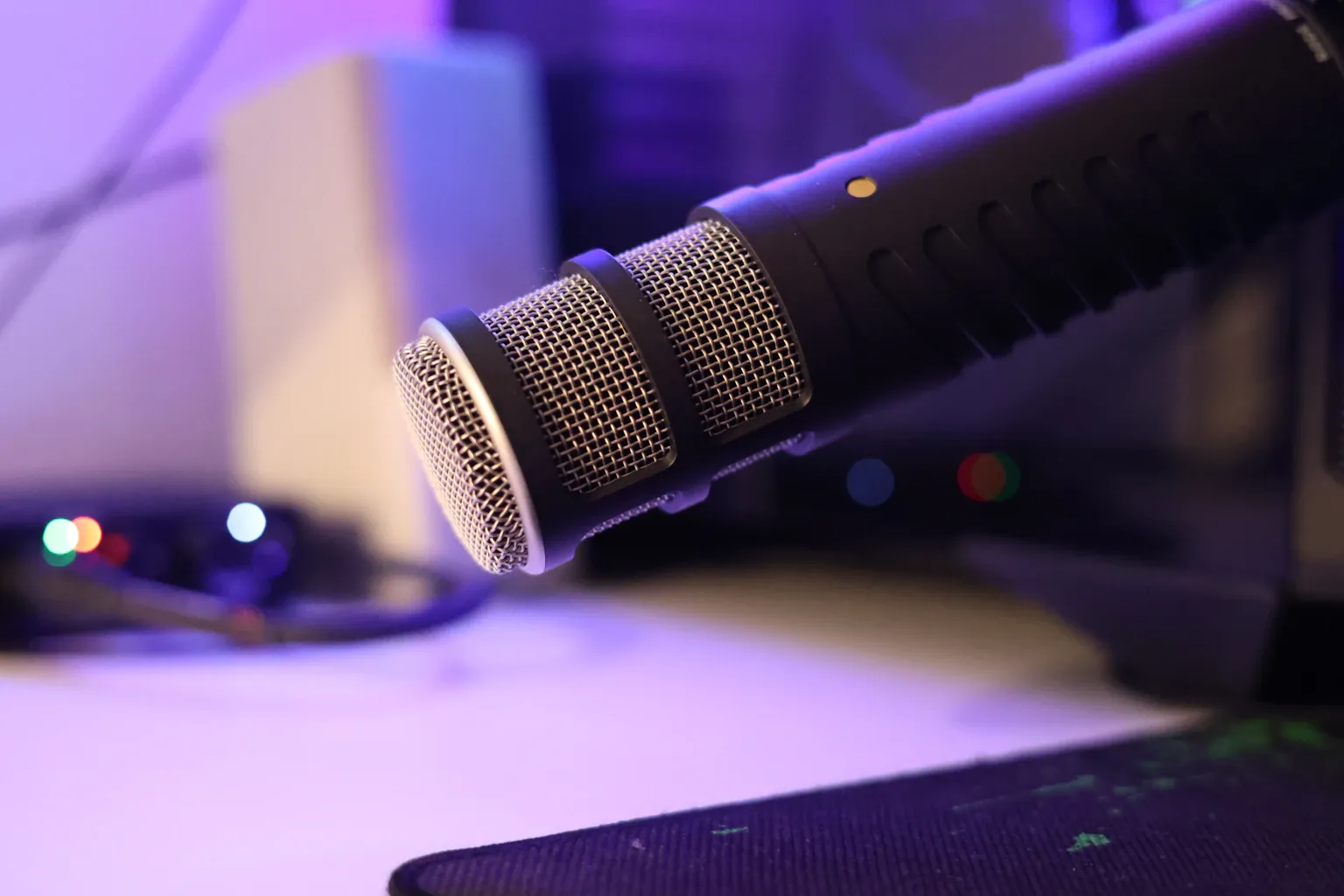 Close-up of a professional broadcast microphone on a radio studio desk ready for Easter holiday show prep and spring content recording