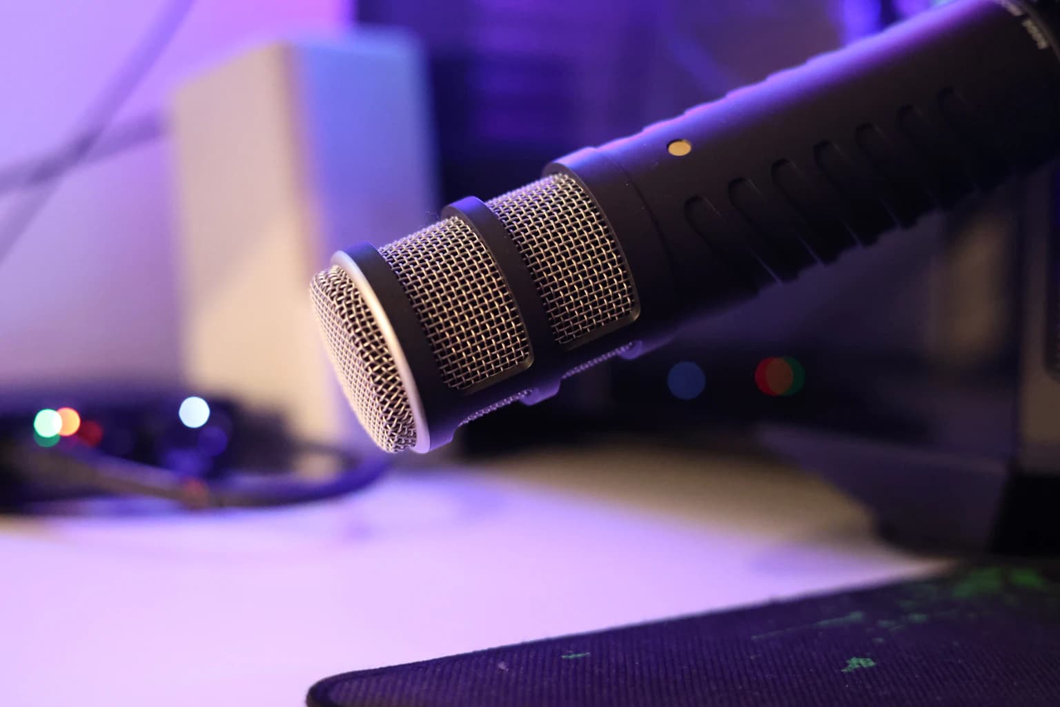 Close-up of a professional broadcast microphone on a radio studio desk ready for Easter holiday show prep and spring content recording