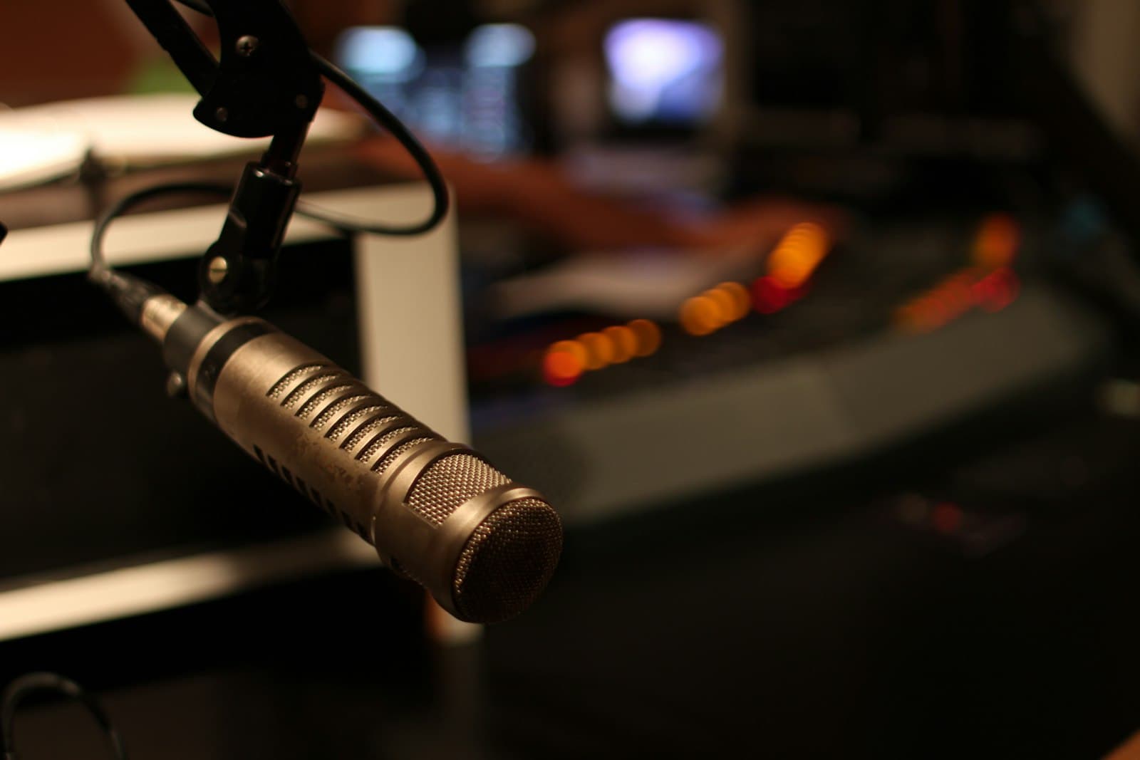 Professional broadcast microphone in modern radio studio representing the launch of Radio Content Pro