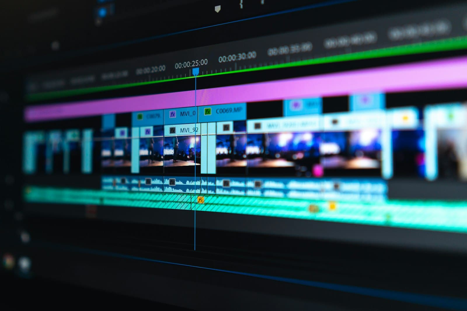 Radio broadcast station control room with multiple shows and daypart scheduling displays
