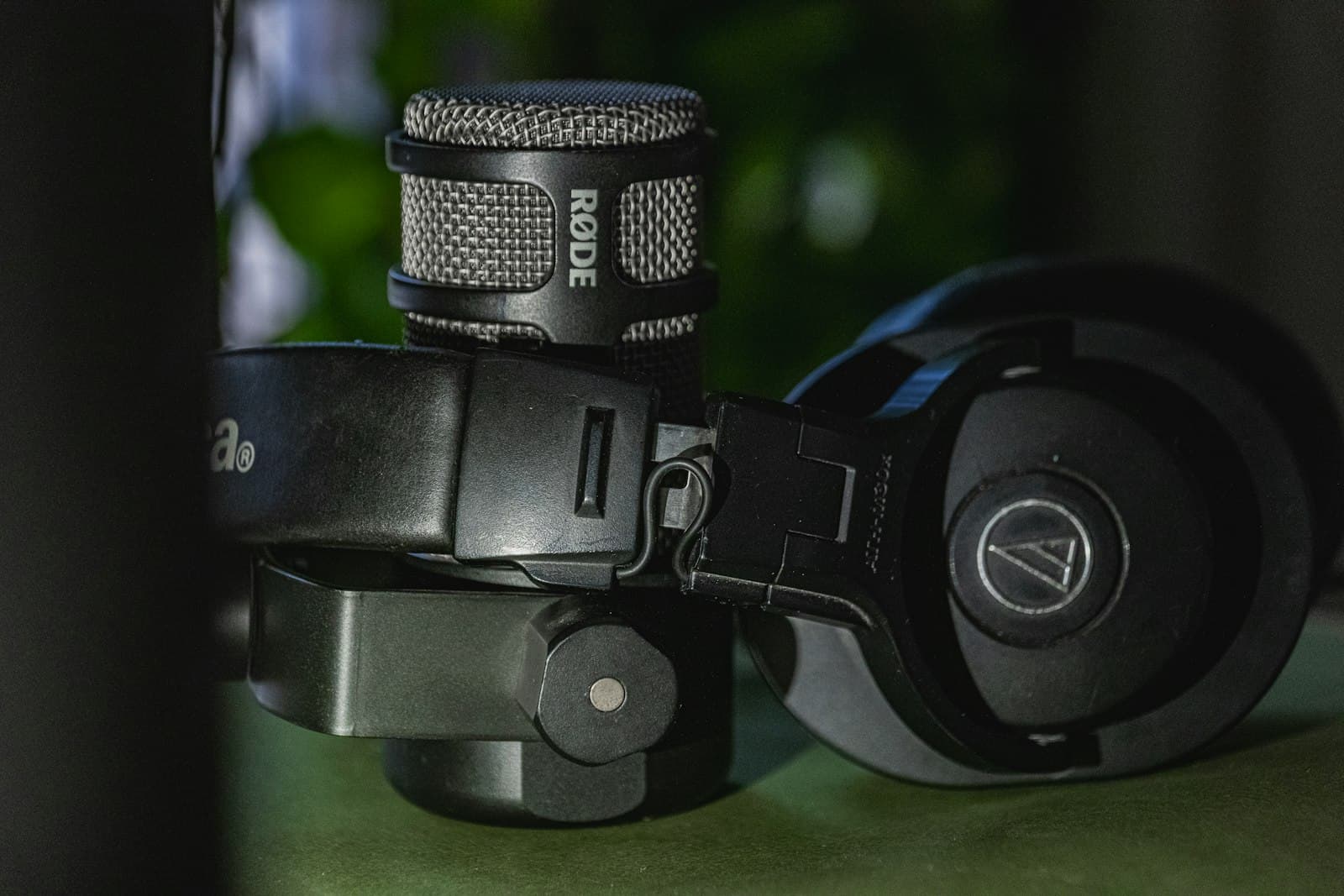 Solo radio host with professional headphones recording in broadcast studio